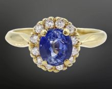 A sapphire and diamond cluster ring,