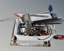 A metal trolley together with a box of further tools including winch etc.