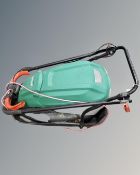 A Qualcast electric mower.