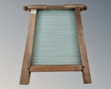A pine and glass washboard.