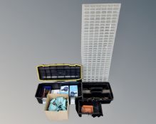 A Stanley Fatmax tool box containing hand tools, rechargeable spotlights,