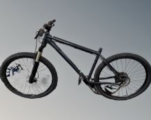 A Pinnacle Iroko offroad bike, lacking seat.