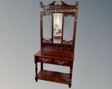 A Victorian style hall stand fitted with two drawers,