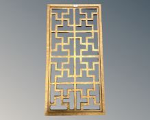 A beech wall plaque, 53cm by 104cm.