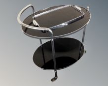 A chrome and glass two tier drinks trolley