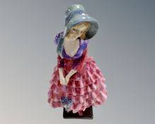 A Royal Doulton figure - Priscilla HN 1340 CONDITION REPORT: Hairline crack to base