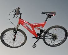 A gent's Muddyfox Stomp offroad bike.