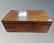 A Victorian rosewood writing box.