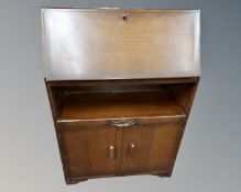 An early 20th century oak bureau.