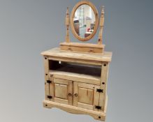 A contemporary entertainment stand and a pine dressing table mirror fitted a drawer,