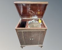 An early 20th century mahogany Minster record player in cabinet.
