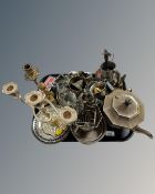 A tray of metalware including candelabra, bottle coasters, part tea service etc.