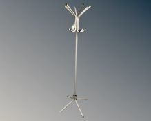 A contemporary metal hat and coat stand