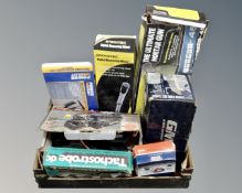 A box of assorted boxed tools including digital measuring wheel, Black & Decker sander,
