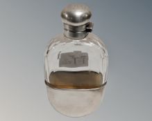 A Mappin & Webb silver plate and glass hip flask.