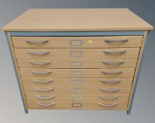 A contemporary eight drawer chest.