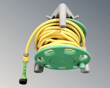 A garden hose on reel.
