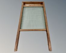 A pine and glass washboard.