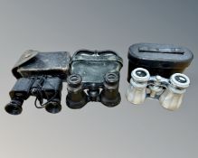 A pair of mother of pearl opera glasses in case, two further pairs of field/opera glasses,