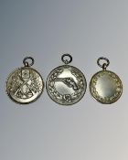 Three silver shooting medallions. CONDITION REPORT: One awarded for Bisley.