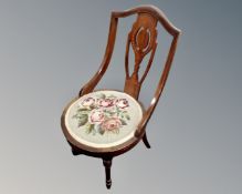 A late Victorian inlaid mahogany chair,