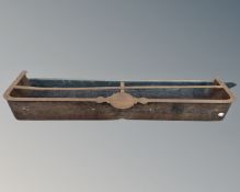 A 19th century steel fire curb.