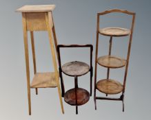 An Edwardian oak cake stand,