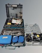 A glue gun, a Bosch 12v pump and a Kamasa tools 124-piece combined socket and spanner set.