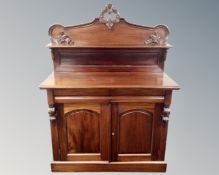 A Victorian style stained hardwood chiffonier.