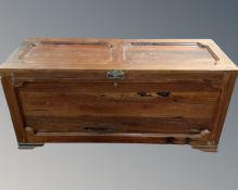 An Eastern hardwood blanket box.