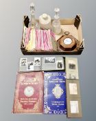 A box containing lead crystal decanters, stoneware hot water bottles, coronation volumes,