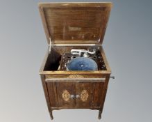 A Minster oak cased gramophone.