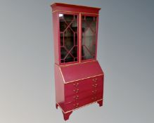 An Edwardian oak painted bureau bookcase.