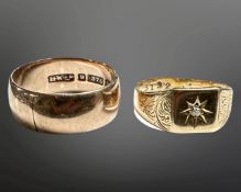 A 9ct gold wedding band and a further gold signet ring,