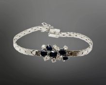An 18ct white gold sapphire and diamond bracelet, approximately 1ct of diamonds, length 17.5cm.