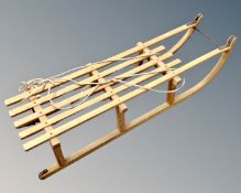 A vintage wooden sledge.