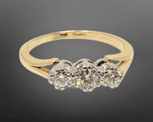 An antique 18ct gold platinum three stone diamond ring, size I CONDITION REPORT: 2.
