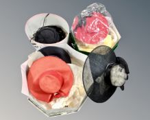 Three hat boxes containing lady's formal hats.