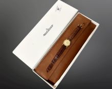An 18ct yellow gold Jaeger le Coultre lady's quartz wristwatch, original brown leather strap,
