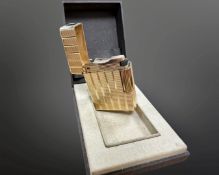 A French Dupont gold plated lighter in box.