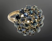 A 14ct gold sapphire cluster ring (one stone deficient),