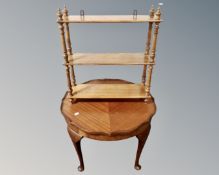 A beech three tier hanging wall shelf together with a 20th century mahogany occasional table.