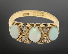 An antique 18ct gold opal and diamond ring,