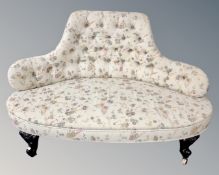 A Victorian button back corner settee.