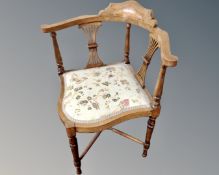 A 19th century inlaid mahogany corner chair.