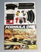 A Formula 1 Scalextric set in box.