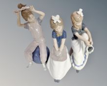 Three Nao seated girls with bow in hair (3,