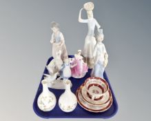 Quantity of continental figures, Leonardo figure, pair of Wedgwood vases,