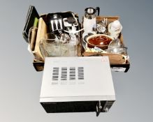 A Russell Hobbs microwave together with two boxes containing kitchenalia.