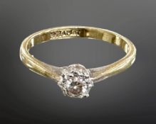 An 18ct gold and platinum solitaire diamond ring. CONDITION REPORT: 2.
